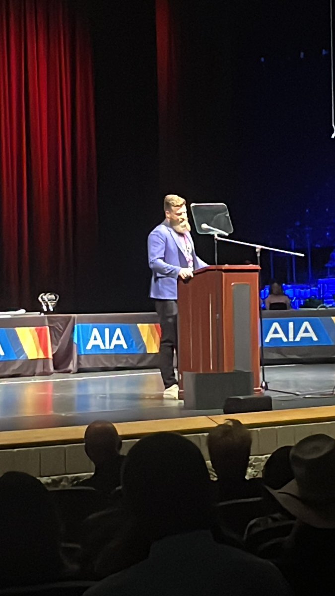 At AIA end of year awards. Closing speaker is Ryan Fitzpatrick. He had all the students that were nominated but did not win $1000 each to be used for college. How cool is that!!! @ZachAlvira @KevinMcCabe987 @azc_obert