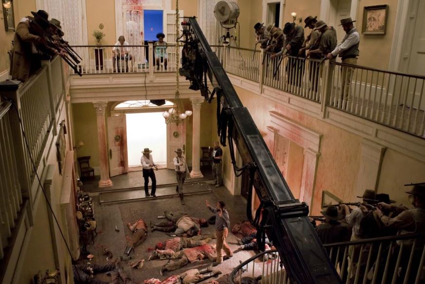 #BehindTheScenes #DjangoUnchained (2012) With the help of a German bounty-hunter, a freed slave sets out to rescue his wife from a brutal plantation owner in Mississippi. #JamieFoxx #ToddAllen #LewisSmith overhead hallway 'face-off' shot. #FilmX 📽️ 🎬