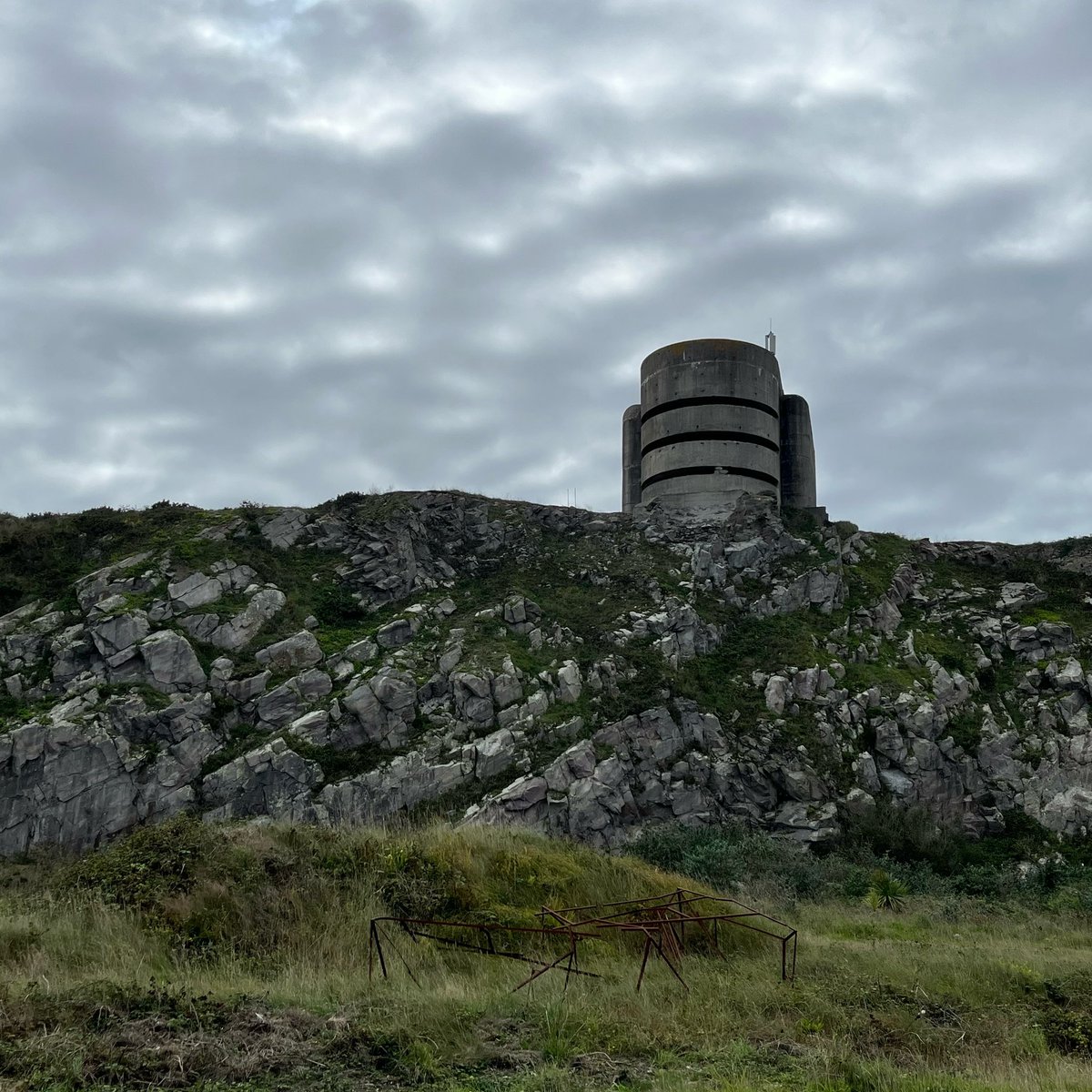 The massive Marinepeilstand 3 or MP3 (Naval direction finding tower 3). Each floor was intended to observe the fire of a medium coastal artillery battery within five similar positions which were never constructed.