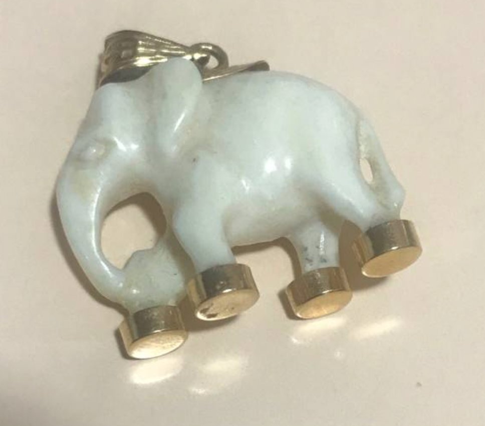 GT's Exquisite Rare Ivory and 18K Gold Elephant Pendant! #ExquisiteJewelry #RareElephantPendant #IvoryJewelry #18KGold #ElephantPendant #LuxuryJewelry #VintageJewelry #CollectiblePendant #UniquePendant #GainesvilleThings #JewelryCollectibles gainesvillethings.com/product/rare-i…