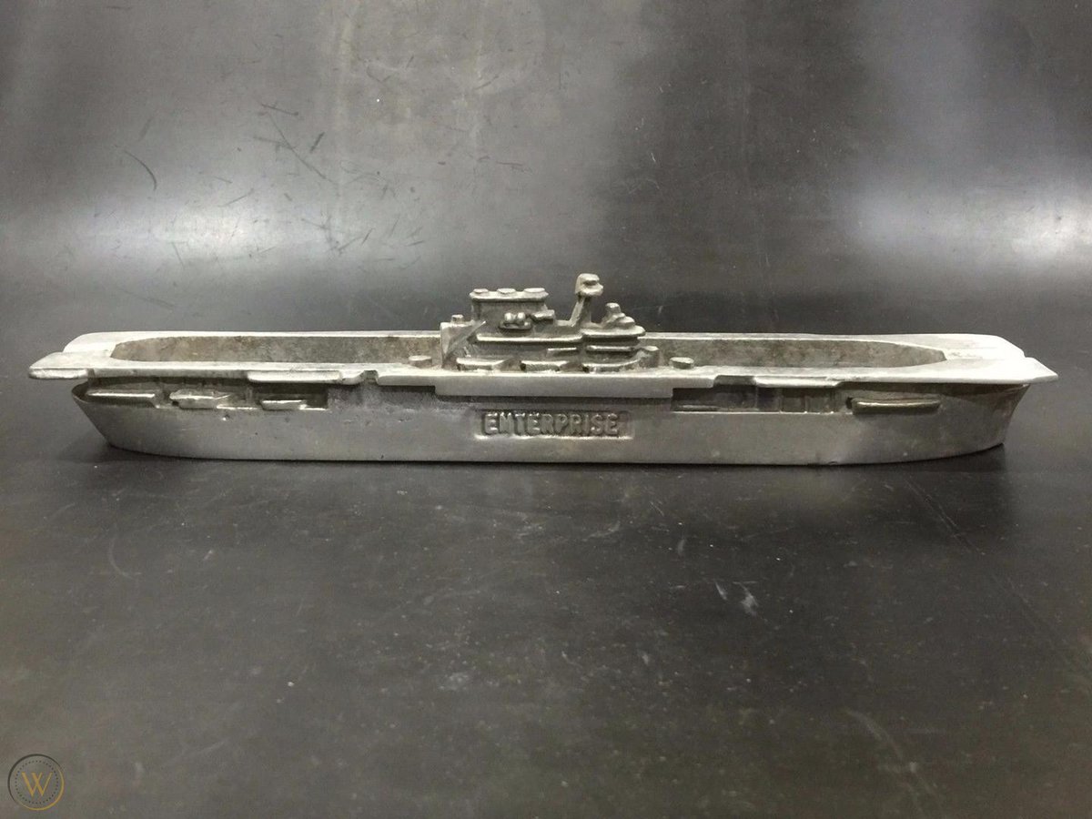 #OTD in 1938, USS Enterprise (CV-6) was commissioned. War Department officials and VIPs attending the ceremony were presented with aluminum model 'Big E' ashtrays that had been cast at the Newport News Shipbuilding foundry as souvenirs. The ashtrays are now valued by collectors.