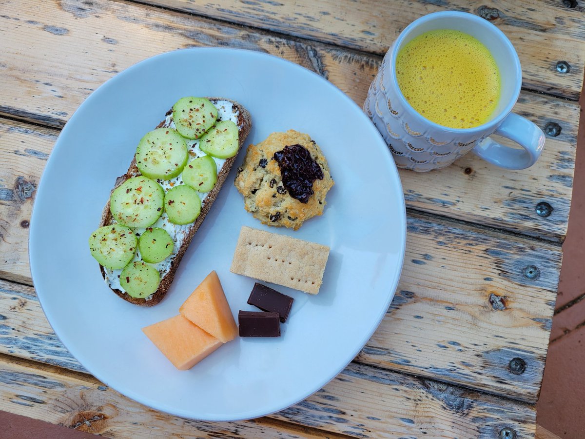 Mother's Day Brunch was a rye toast with cream cheese, cucumbers, truffle salt, red pepper flake and pepper, a gluten free currant scone with blackberry jam, a gluten free Scottish shortbread, Volo Dark Chocolate, cantaloupe and a golden milk tea. I'm full! #mothersday