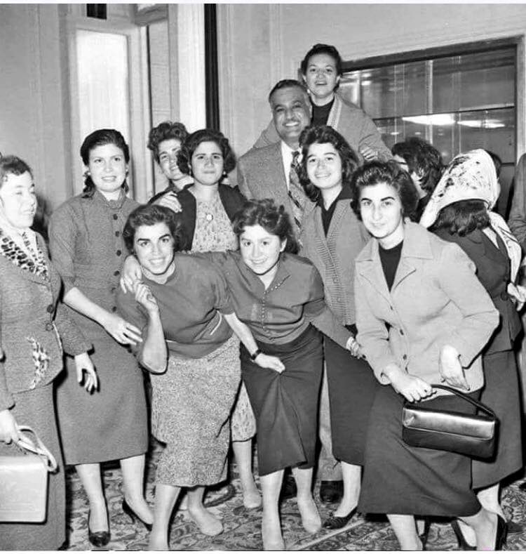 Palestinian teachers in Gaza pose with Gamal Abdel Nasser (1956)