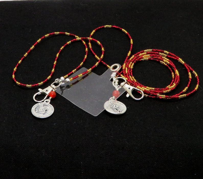 Show your #USMC pride with our Phone Lanyards featuring the St. Michael & Eagle design. Made in the USA with quality craftsmanship, these lanyards come in Red and Gold colors and include Cross Body and Wrist lanyards. Stand out with #MadeInUSA products 🇺🇸.buff.ly/4bAE07a