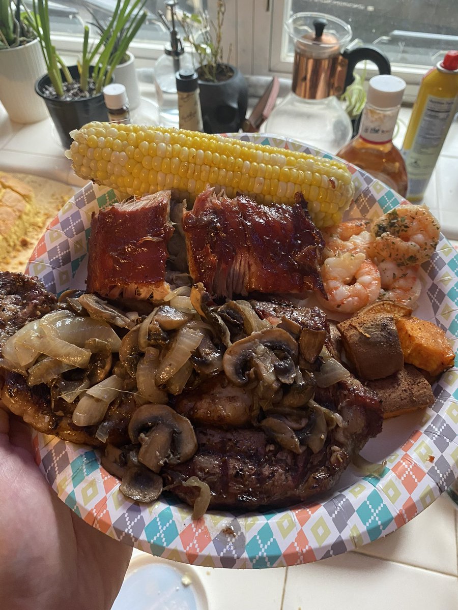Ribs, steak, shrimp, cornbread, corn on the cob & sweet potatos. I aim to spoil.