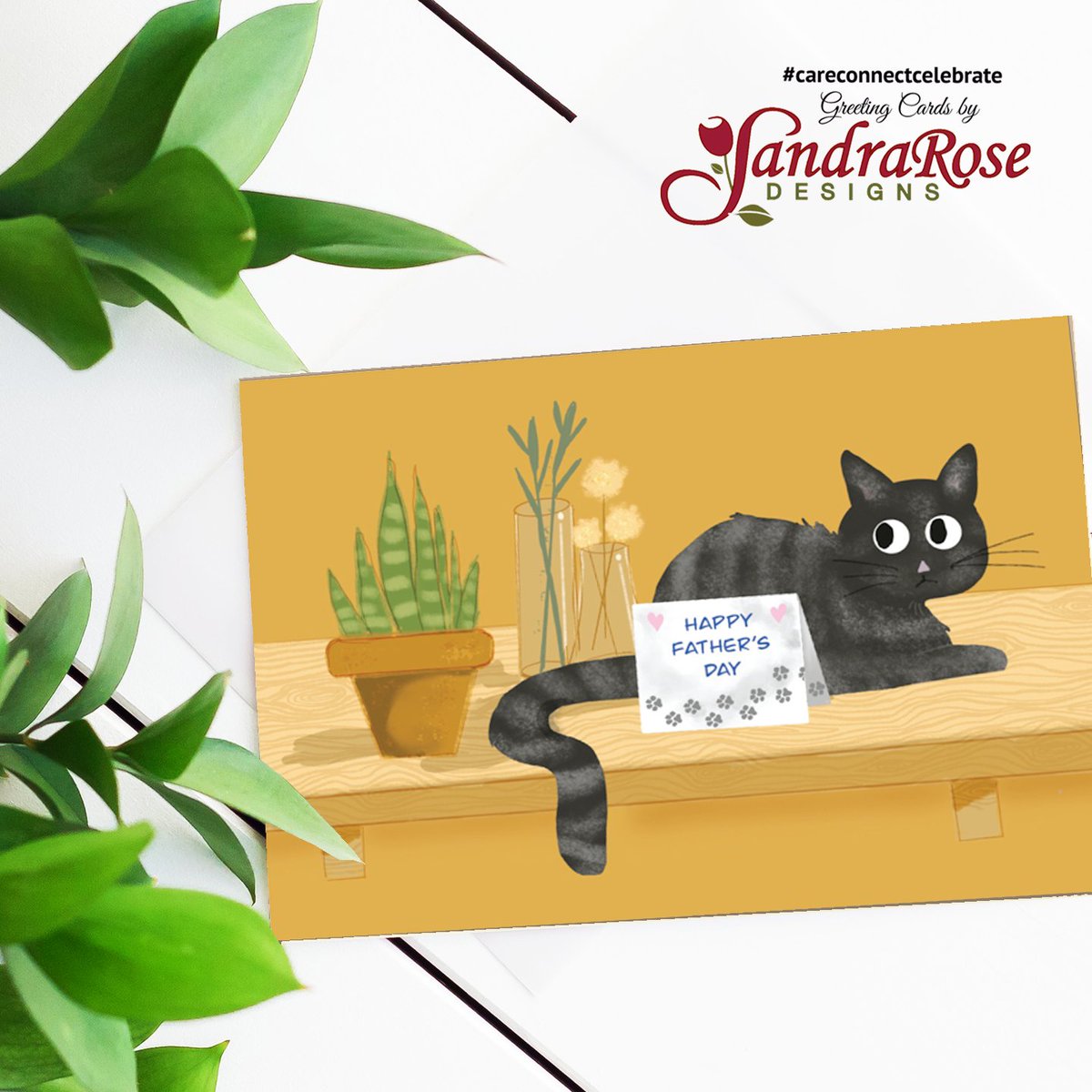 This general Father’s Day card shows a funny black and gray striped cat looking at a standing greeting card with paw prints and Happy Father’s Day written on it. #CareConnectCelebrate #SandraRoseDesigns @GCUniverse #Greetingcards #Greetingcard greetingcarduniverse.com/holiday-cards/…