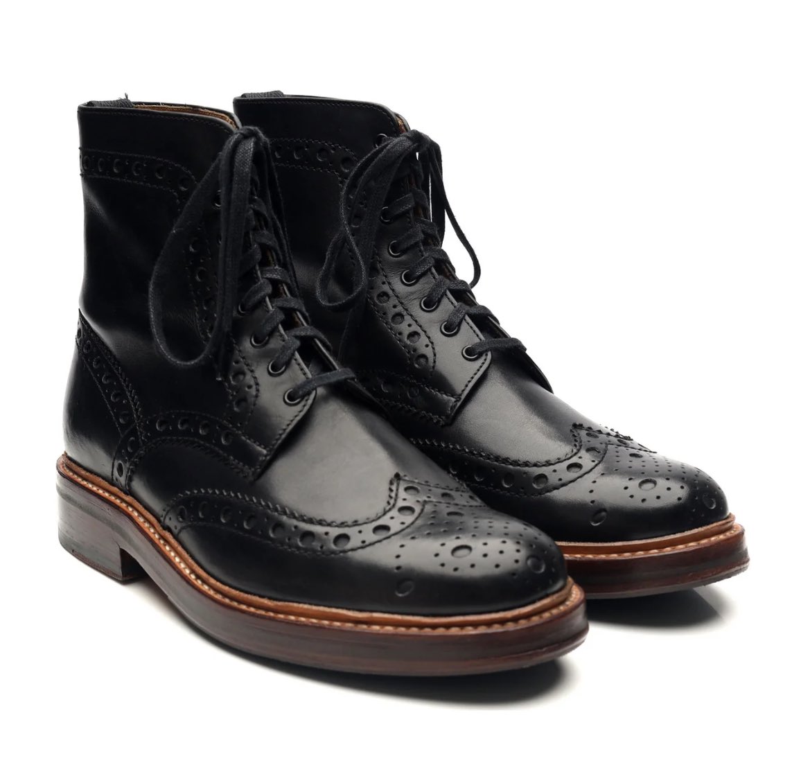 Edwin’s shoes might be the Grenson Fred' Black Leather Brogue Boots original retailing price £310