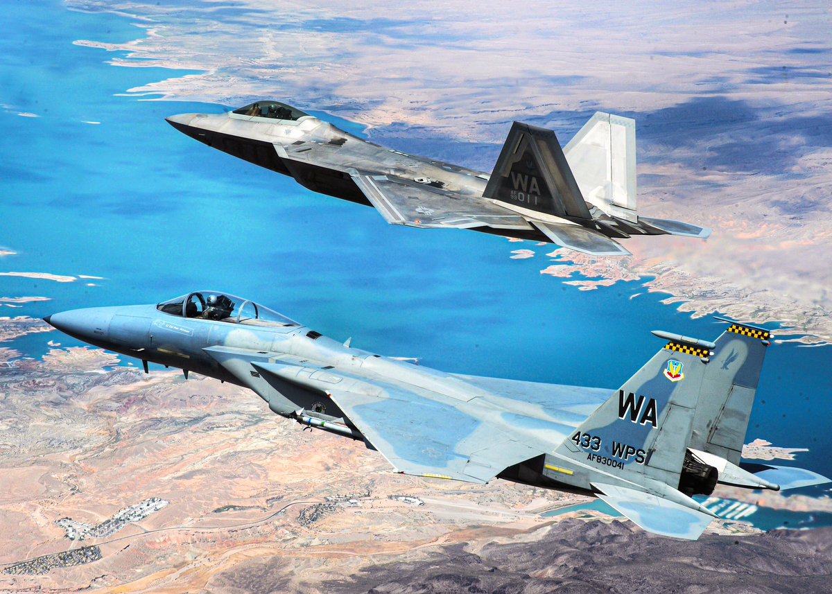 The 433rd Weapons Squadron’s F-22 and F-15C. (gruenwald)