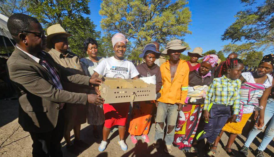 The Permanent Secretary, Professor dr. Obert Jiri, hands over chicks to youths in Tsholotsho constituency, Matebeleland North Province, under the Presidential Poultry Scheme. Food Security: Everywhere, Everyday