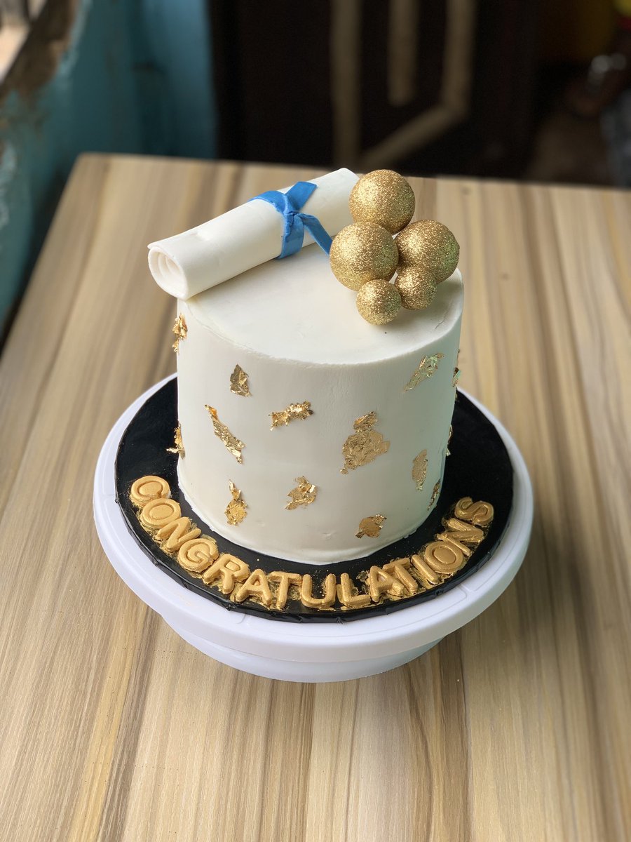 The cake we made for UNN 52nd convocation .fondant beautified with gold leaf. Please repost