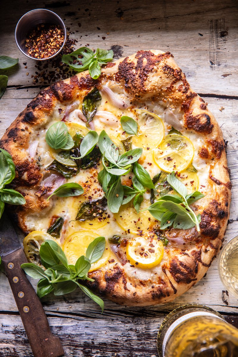 New! 3 Cheese Lemon Basil Pizza. Just the right amount of basil and cheese! Every last bite of this pizza is delicious. There never seem to be enough slices. Make 2! halfbakedharvest.com/lemon-basil-pi…