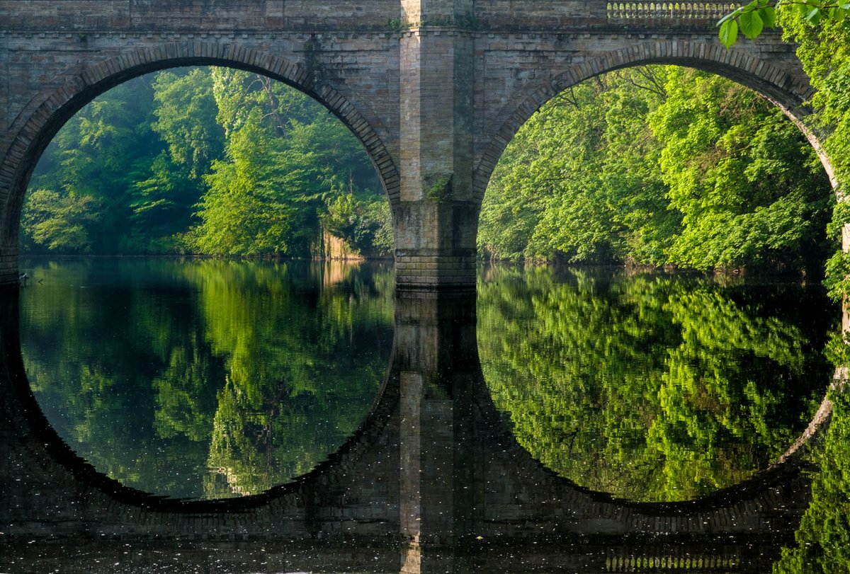 Reflections and symmetry at Prebends Bridge this morning Durham, County Durham