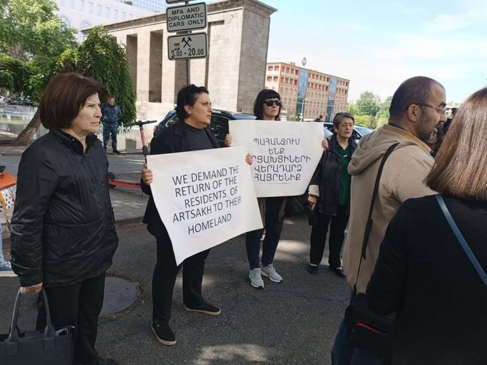 In front of Armenian MFA.  

'We demand the return of Karabakh/Artsakh Armenians to the homeland'  

The OSCE Chair-in-Office, Minister for Foreign and European Affairs and Trade of Malta, Ian Borg is in Armenia.