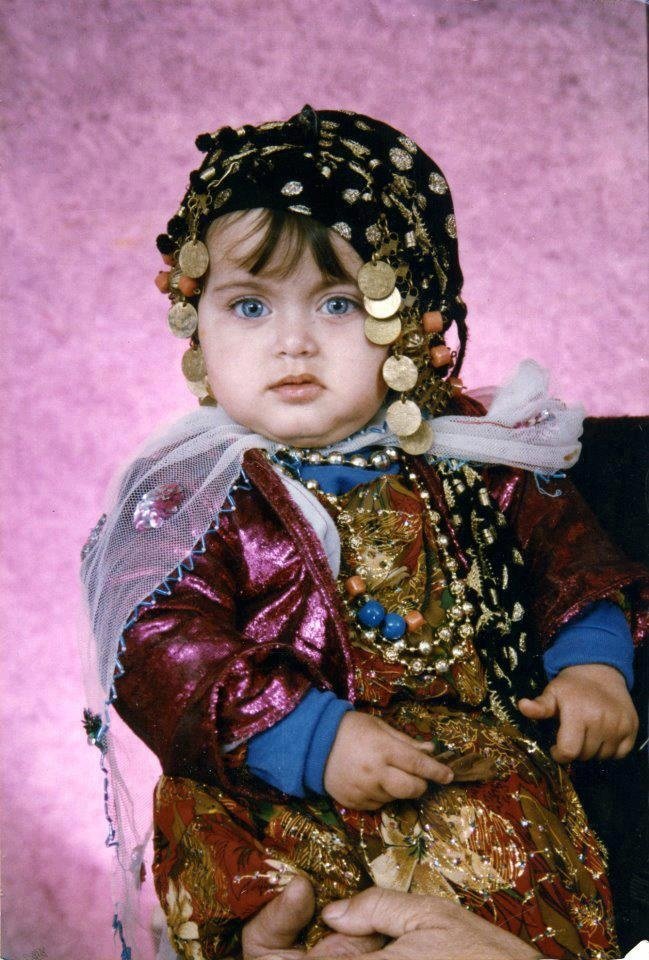 A Kurdish girl in a traditional Kurdish dress