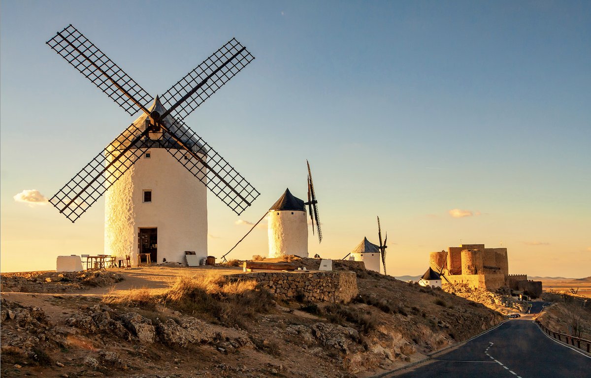 Less than a 2-hour drive from #Madrid is the town of Consuegra. With the stunning Castle of Consuegra, the landscape is only more dramatic with its surrounding 12 windmills. Come and see the impressive setting! Discover more ➡️ bit.ly/4alwrky #VisitSpain