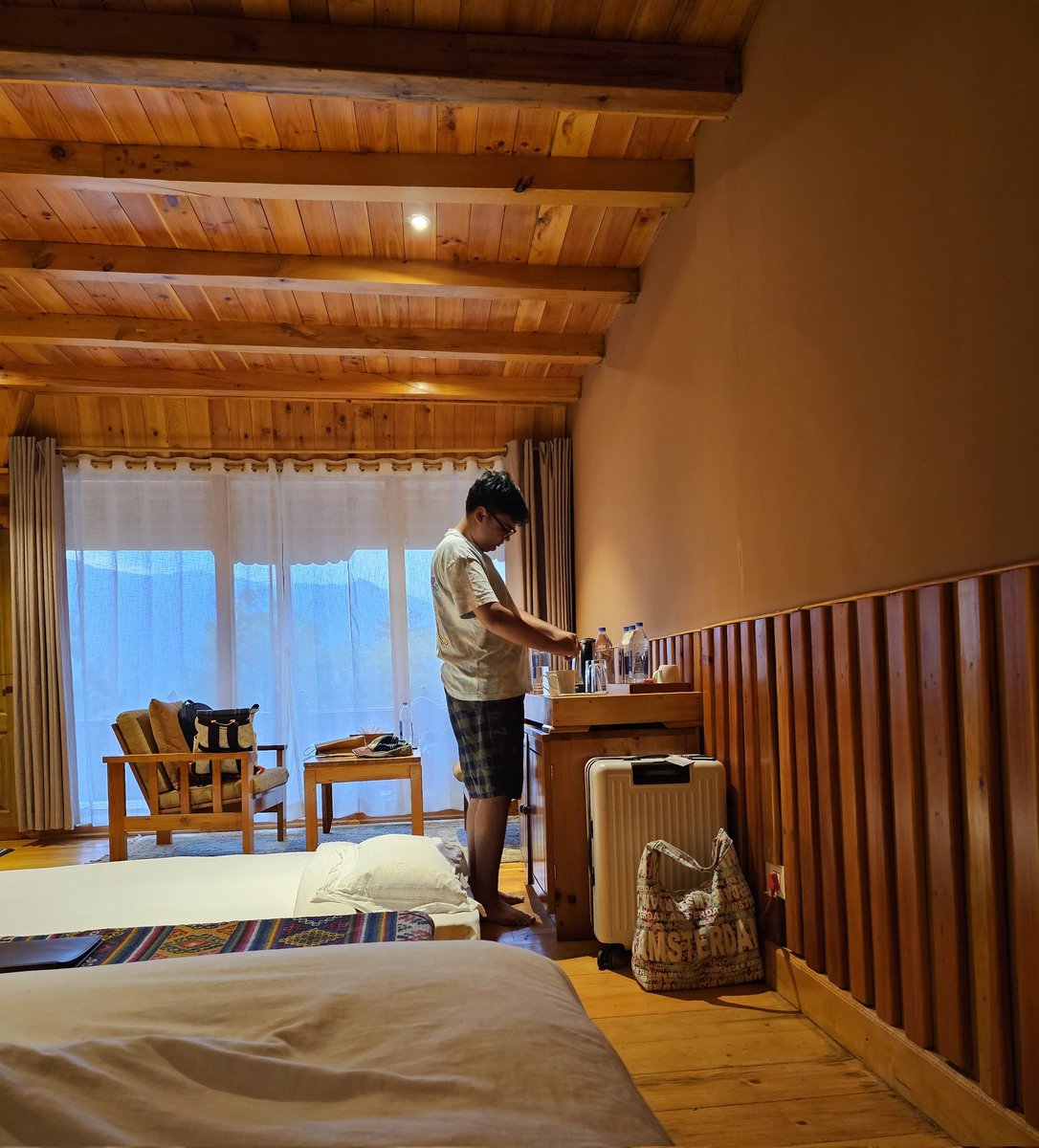 DrDeepakKrishn1's tweet photo. Son makes coffee for us after a tough trek to #TigerNest monastery. 
I am happy to share that he scored an aggregate of 96.6% in CBSE 10th board exams with 100/100 in math! We got the result just after we came out of the Tiger nest temple. 🙏 
#Bhutan https://t.co/da0kjjY2tY
