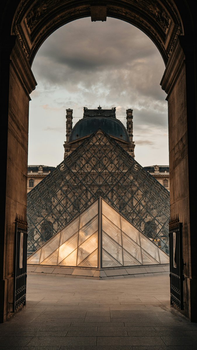 The glass pyramid entrance at the Louvre Museum, designed by architect I. M. Pei, has become an iconic symbol of the museum. 💫 🌊 🛳️ 

#VisitFrance #TravelGoals #GrandCenturyCruises