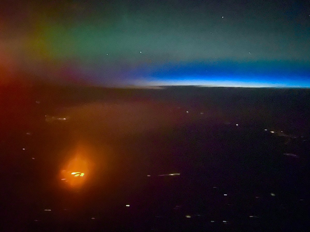 Northern lights as viewed from my Calgary-Ottawa flight, between 1 and 3 AM local time That last one seem to be forest fire in Manitoba, northwest of Winnipeg