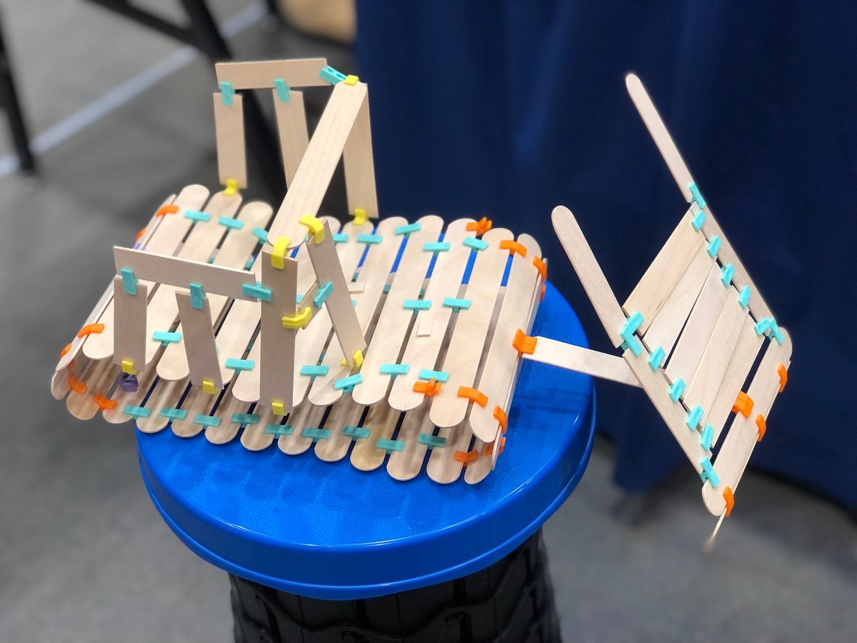 NurcsToy's tweet photo. Sometimes people just need a spark of inspiration, and then they ignite. I asked the kiddo who was building this what he was working on early in the process. He wasn’t sure yet, and I said it looks like a bulldozer. Lo and behold, it became a bulldozer. #stem #craftsticks https://t.co/GPicsLfy4S