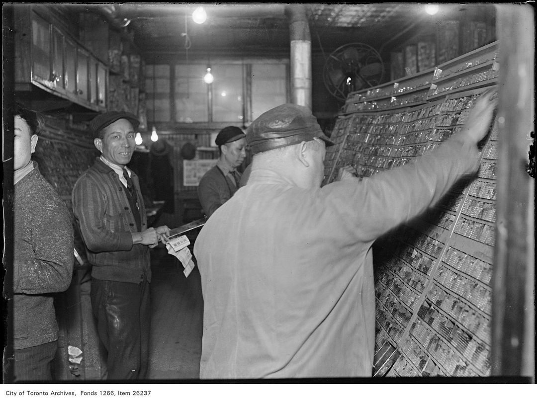 Compositor Lee Wong Toy (right) prepares moveable type for the Shing Wah Daily News, a key Chinese language newspaper in Toronto in 1932. ow.ly/mPop50RzCl4 #AsianHeritageMonth #TOHistory #TorontoArchives