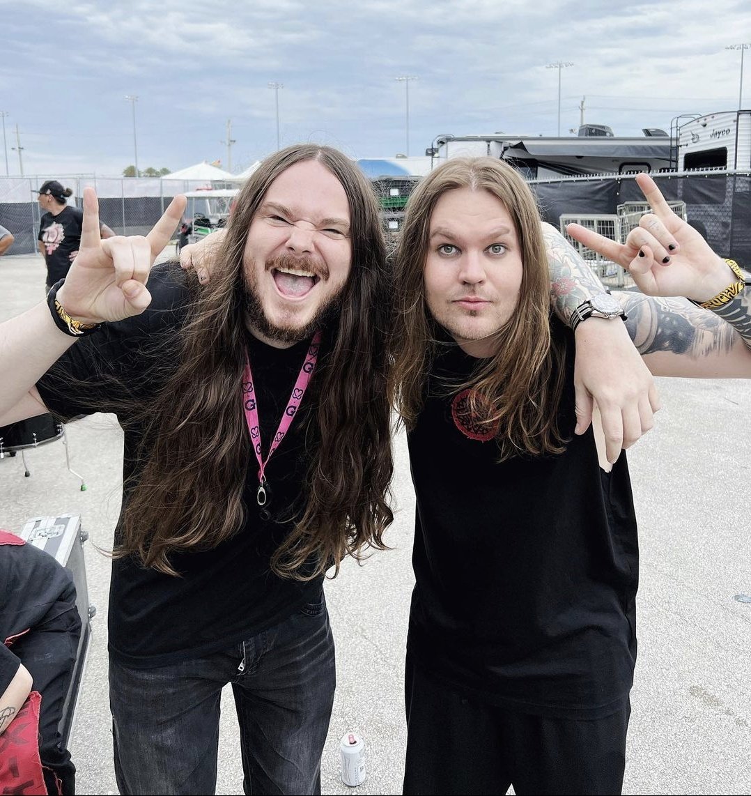 Aaron Pauley (Of Mice & Men) and Niko Vilhelm (Blind Channel) serve in new photo.