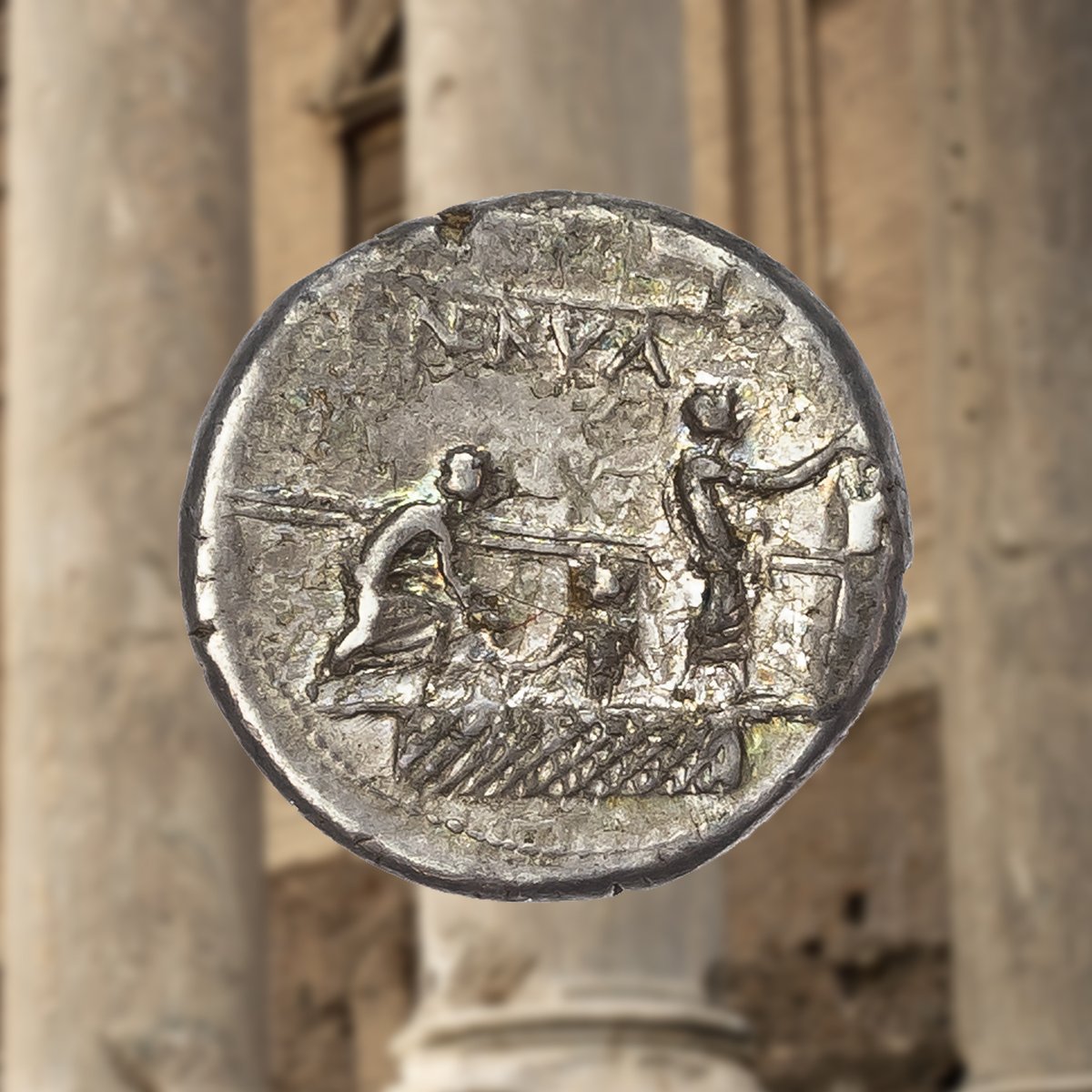 This silver denarius, minted in 113-112 BC by the moneyer Publius Licinus Nerva depicts a voting scene. This was likely an attempt to sway Roman voters into casting their ballot in favour of him, or one of his allies. 
View Lot 107: tinyurl.com/yfh3zzw9
#Romancoins #Denarius