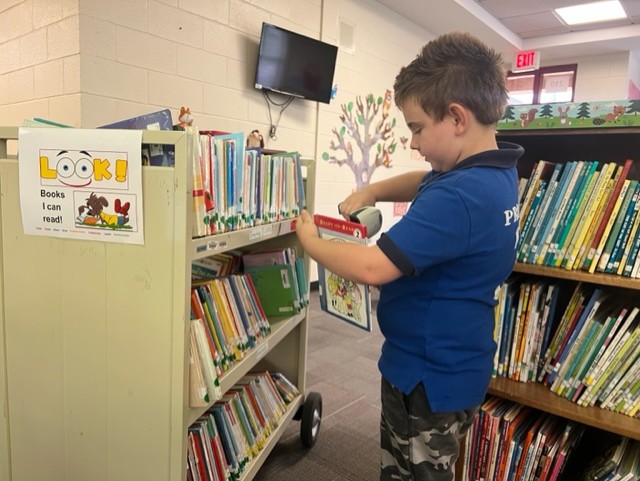 A better media assistant could not be found (he really loves the scanner).  Thanks for helping me scan books for inventory! @aghoulihan @UCPSNC