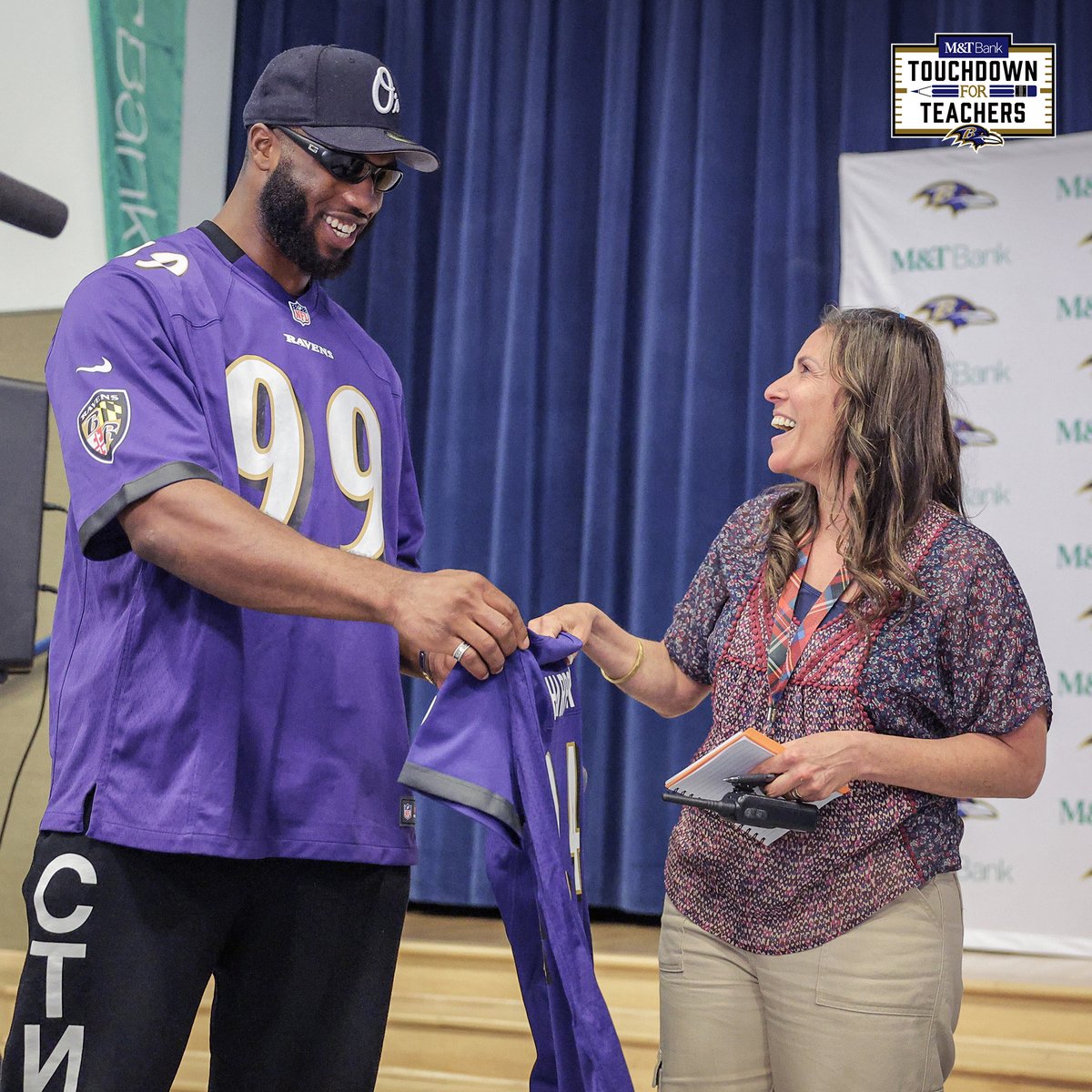 Ravens's tweet photo. .@DafeOweh awarding this year's @MandT_Bank Touchdown For Teachers award recipient  Jaime Harpster, from Padonia International Elementary School! #OurTeamOurCommunity 💜 https://t.co/6Nn39V4ltY