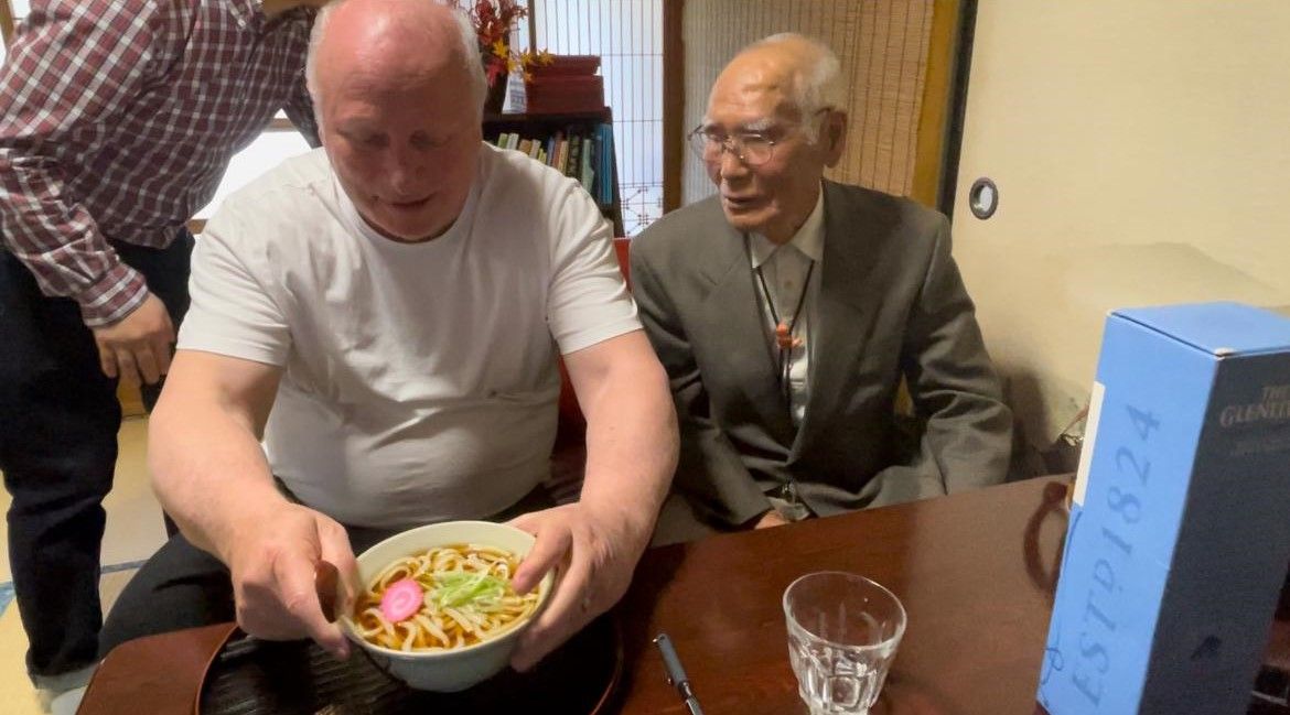 1/4 Douglas Robertson recently visited Japan to meet Captain Kiyato Suzuki whose fishing trawler, the Toka Maru II, rescued the Robertsons after 38 days at sea.