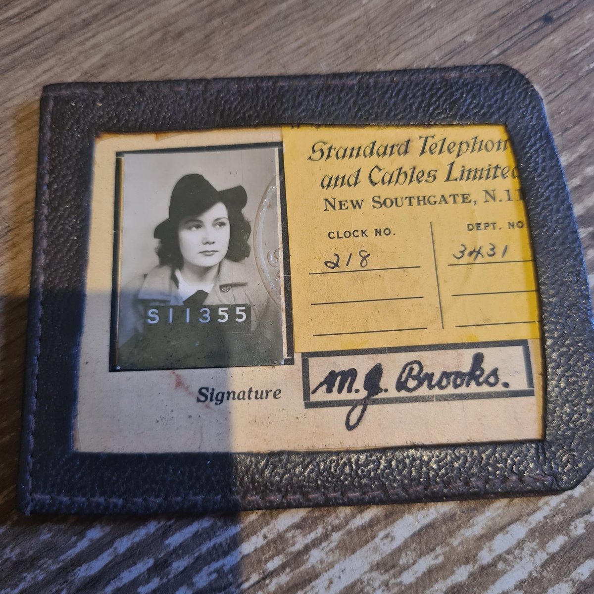 I was sorting through some old paperwork today and found my mum's work ID card. What do you think of her photo? I love the hat.