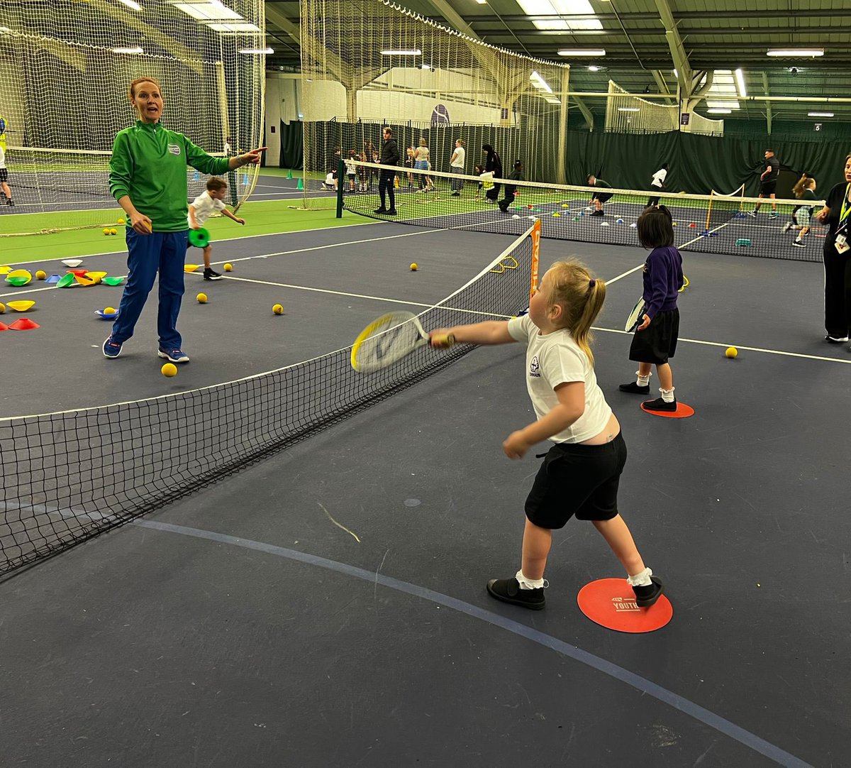 Emmaus_School's tweet photo. A group of Year 1 children enjoyed the KS1 Tennis festival this morning! 🎾 What a fun way to start the week! #emmausyearone #emmaussport https://t.co/2vvLB879IU