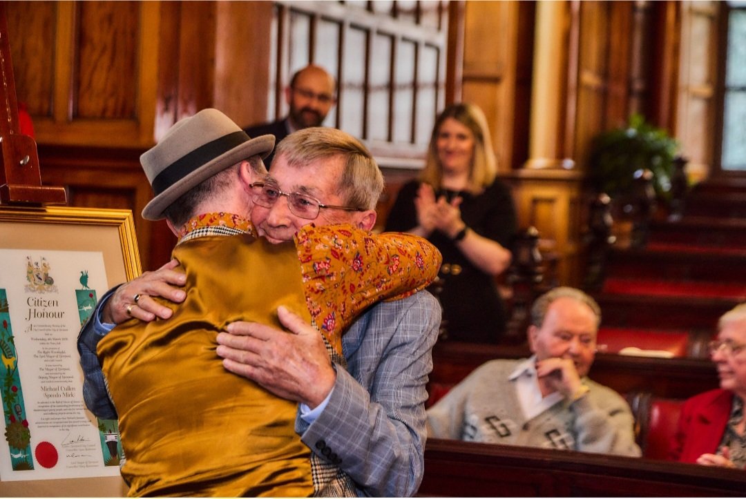 A really special moment as my dad hugs me as tightly as he can as tears of pride trickled down his face at the @TownHallLpool after receiving the Liverpool Citizen of honour Award.