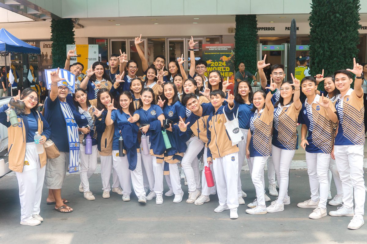 helloryleh's tweet photo. National University Cheer Squadron w/ NUNU 💛💙 GAME 1, NU🐶 VS UST🐯
#UAAPSeason86 
#NUCS
#NUPD

ctto: Joshua Spencer Diasanta https://t.co/QfztLpQr8F