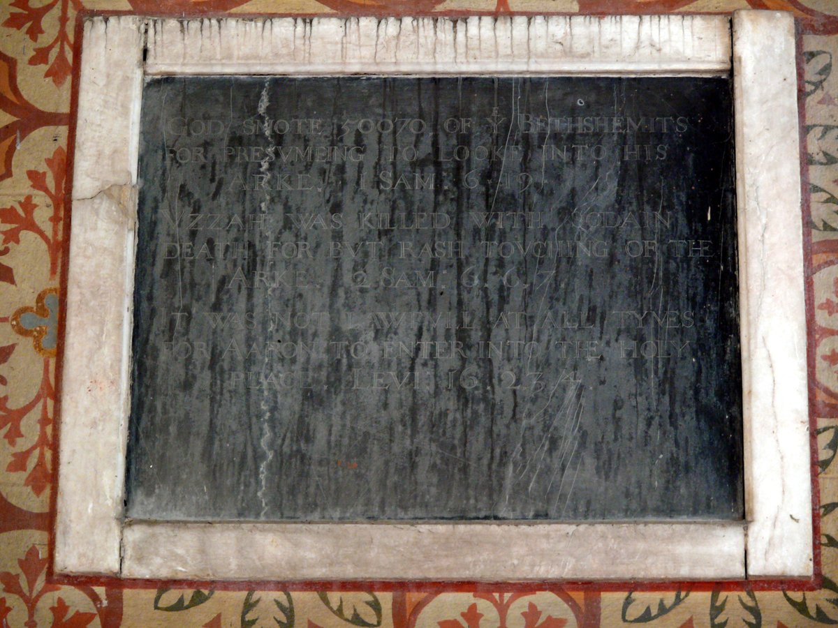 1/ A panel on the internal east wall of the chancel at North Tuddenham appears blank to the naked eye. Flash photography shows wording lightly cut in capital letters on a black marble panel with a vein of quartz running through it and in a simple light-coloured frame, possibly