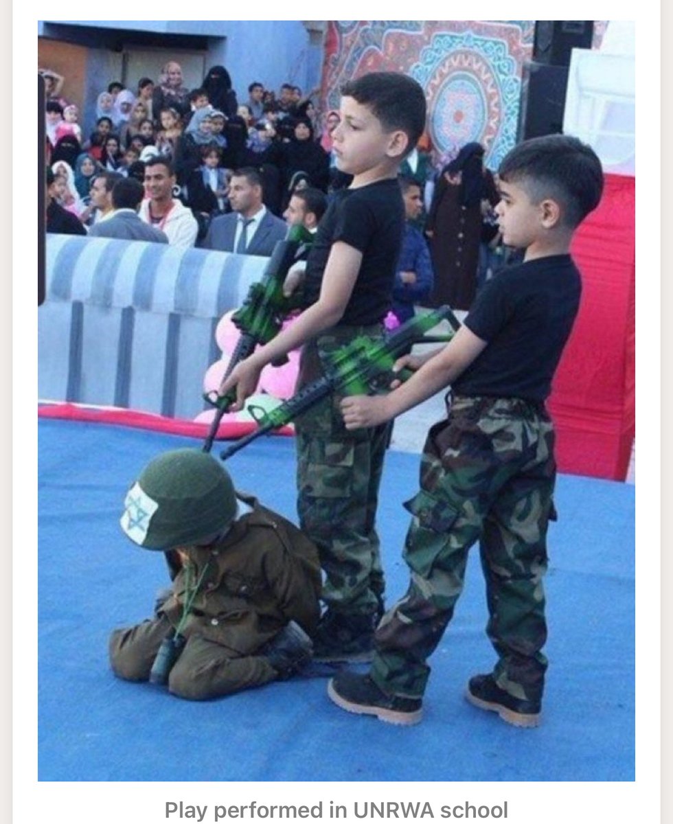 Irishchutzpah's tweet photo. @MataHaritoo @UN_Spokesperson I does include the child soldiers, many of them are 13-18 years and younger.
This is where they start to be indoctrinated.
Taken at show for the parents at an UNRWA school #childIndoctrination #ChildSoldier #Gaza https://t.co/rWTkAmsLSv