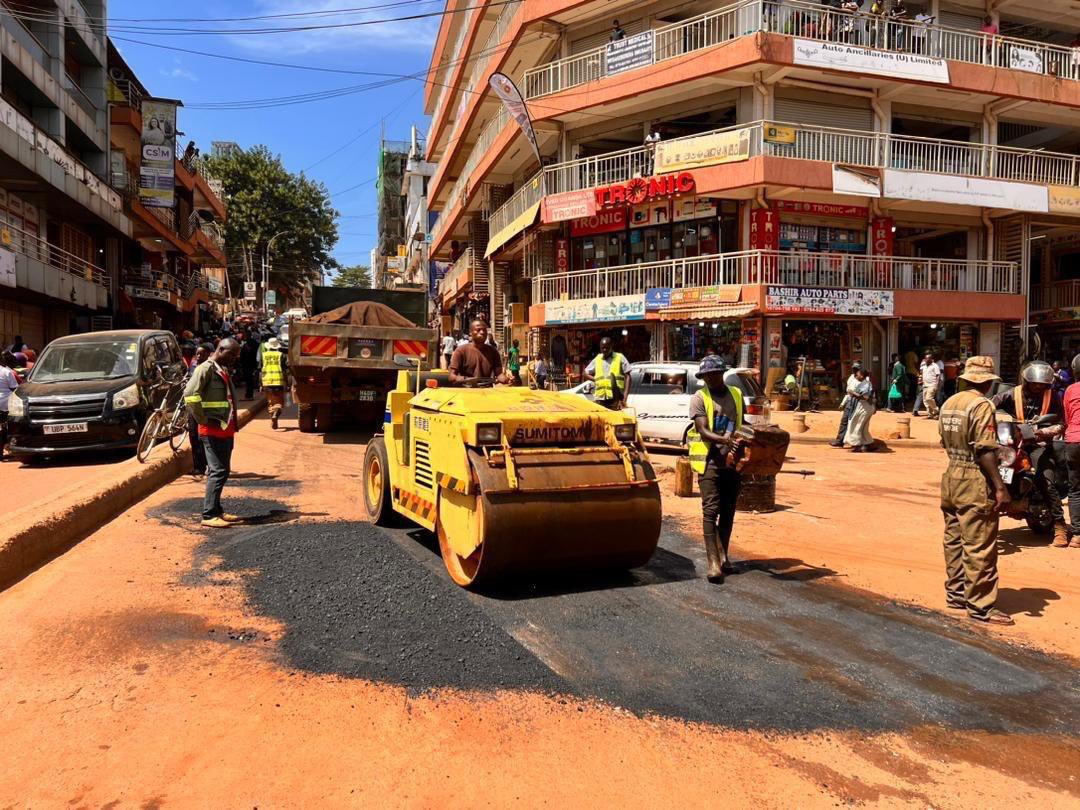The SFC Engineers Regiment in Kampala City is continuing their road repair works, pictured is the progress on Mutaasa Kafeero Roundabout and Kyaggwe Road near Kiseka Market. Stay tuned for updates on the progress of these repairs #UPDFKampalaCityRoadWorks