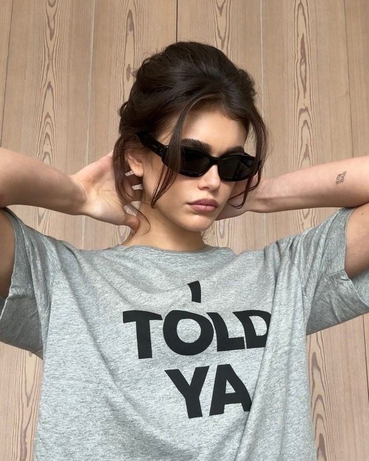 Kaia Gerber sporting the “I TOLD YA” t-shirt from #Challengers 🎾
