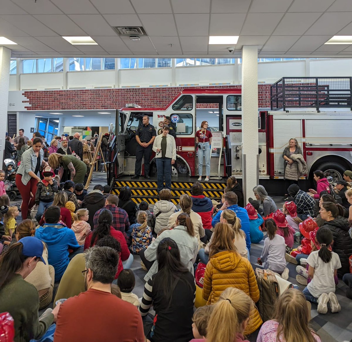 What an exciting Grand Opening of Engine 23 in Fish Creek Public Library! It was so much fun to see so many kiddos lined up with their families, excited to meet the Firefighters & see the new engine addition! #yycAcadia #calgaryLibrary @calgarylibrary