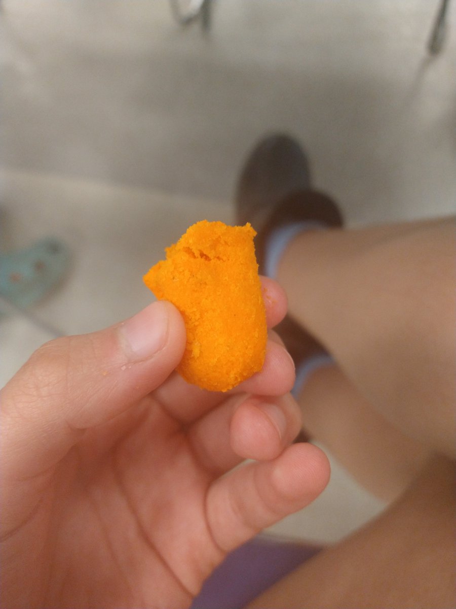 look at this fucking monstrosity I found in my Cheetos at lunch (the circled part is the actual like. Cheeto

it tasted like radioactive cinderblock ballsack torsion