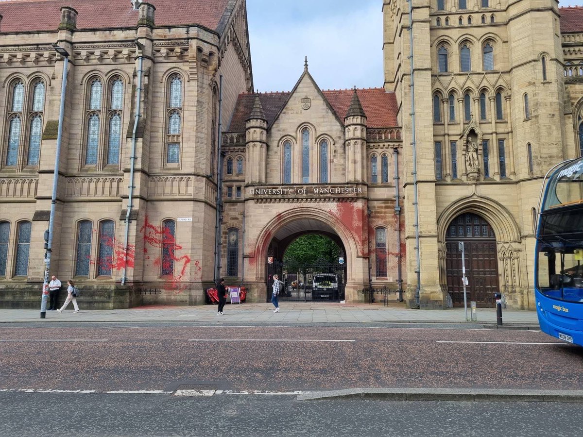 Palestine Action activists spray The University of Manchester with red paint, highlighting their complicity in the bloodshed of Palestinians by Israel. As the University offers its students to engage in studies within illegal Israeli settlements through its partnership with