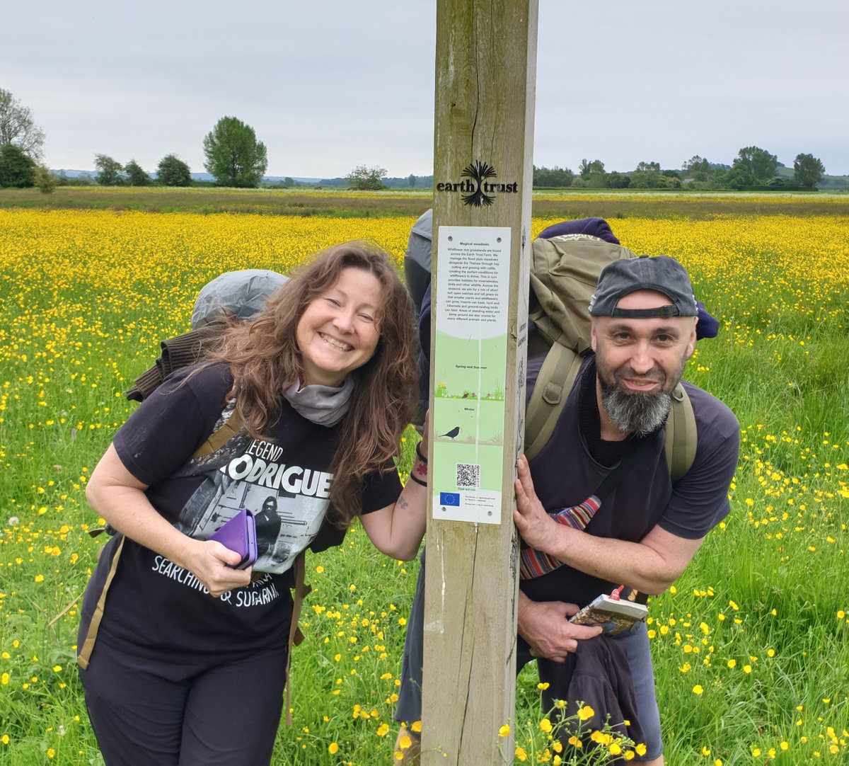 #ThamesPath hikers Stoned Olive and Raphael lovin' the buttercups on the River of Life II meadows this afternoon on their way to climb The Clumps! @earth_trust @NationalTrails @NatTrailsUK