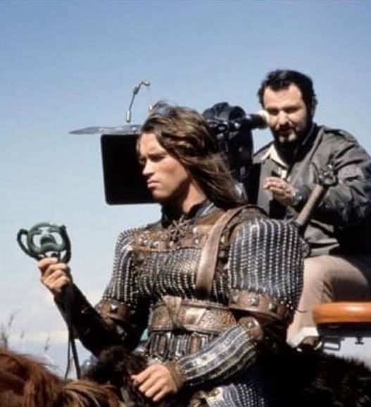 #BehindTheScenes #ConanTheBarbarian (1982) A powerful warrior seeks to avenge the genocide of his people and the murder of his parents at the hands of a snake cult. #ArnoldSchwarzenegger over the shoulder horse shot. #FilmX 📽️ 🎬