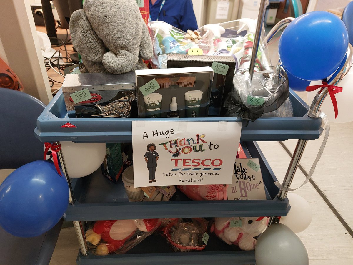 The ribbon has been cut and the C52 Swan team raffle to raise funds to make our day room a more homely space particularly thinking about our Swan patients and their families on dying matters week. All welcome to come and prizes to be won. Thanks to <a href="/Tesco/">Tesco</a> for their donations