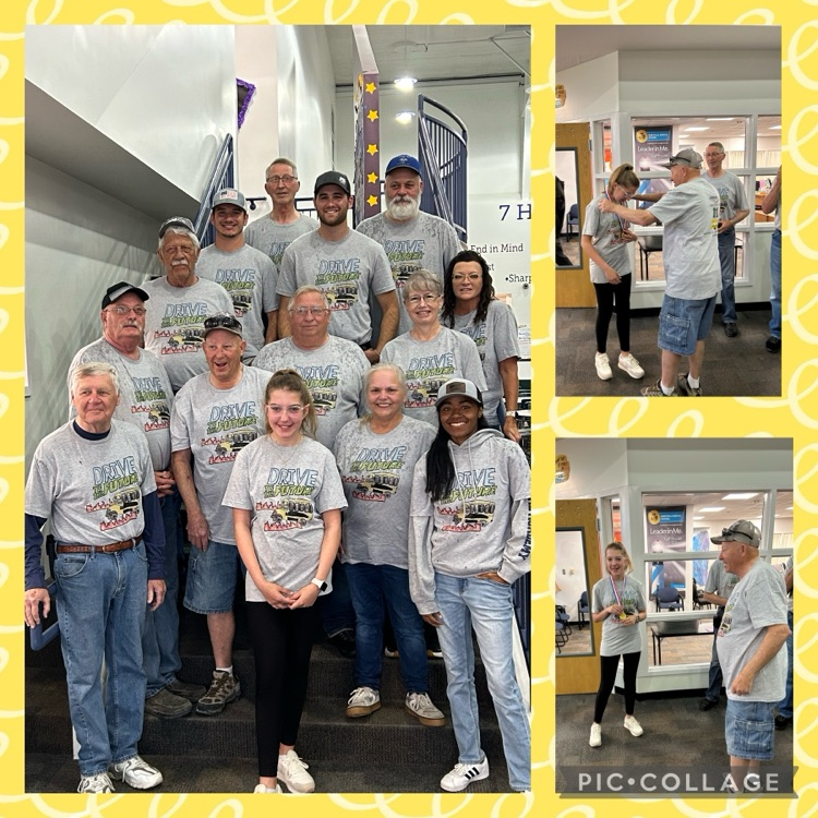 MaryvilleMiddle's tweet photo. Henley Kendrick, 7th Grade, won the Jarnik poster contest with her "Drive to the Future" poster. Pictured are Maryville RII bus drivers and Henley, all wearing her poster that was made into a T-shirt design! https://t.co/C9gKBVaxSQ