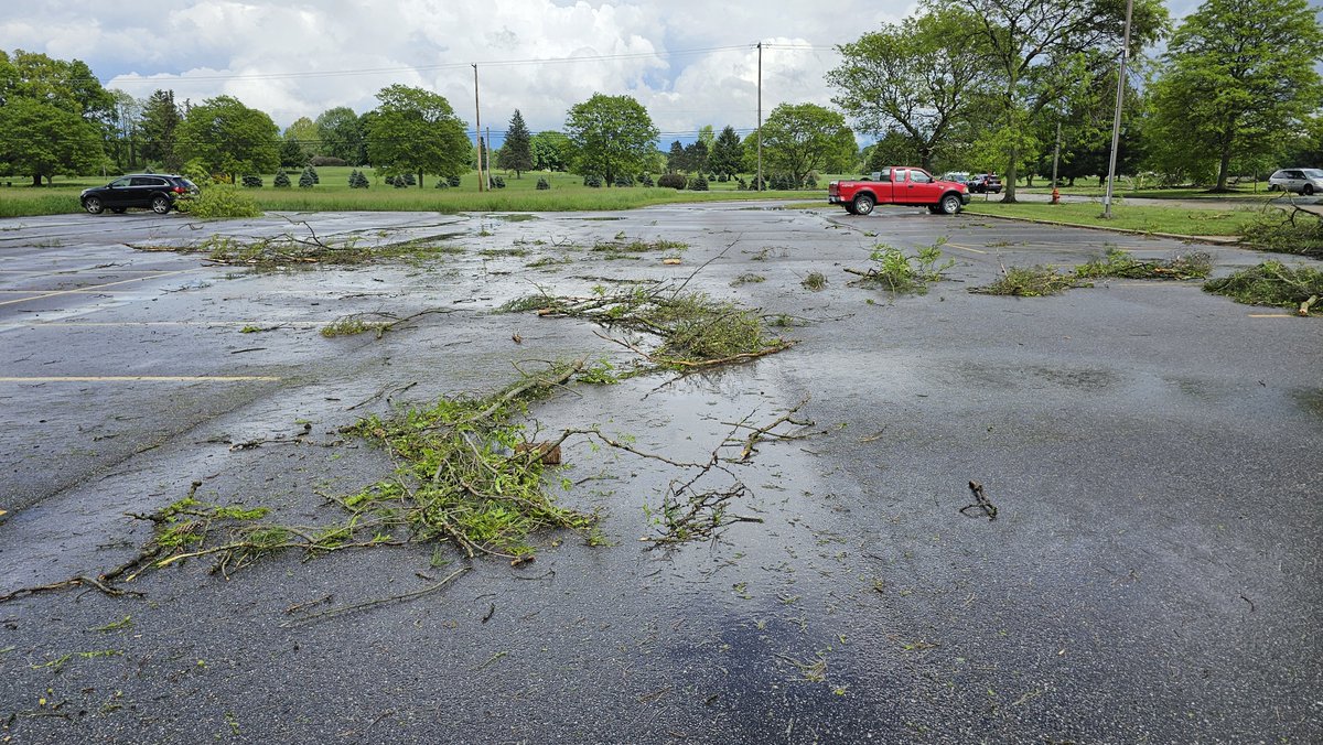 AFugy's tweet photo. @RecordPub I was working when it happened, ripped up some trees.  Pretty sure it came down on my truck as it was wrapped in tree branches(not pictured), crossed the street, and somehow didn't take out the power. https://t.co/SDDFIp2bjx