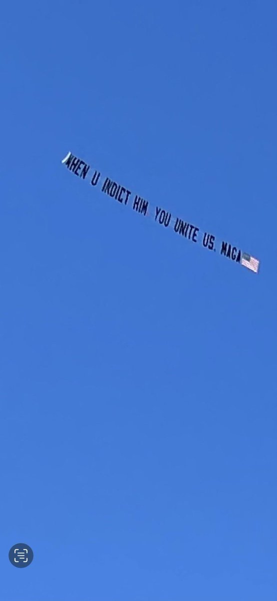 Banner flying over Manhattan courthouse.