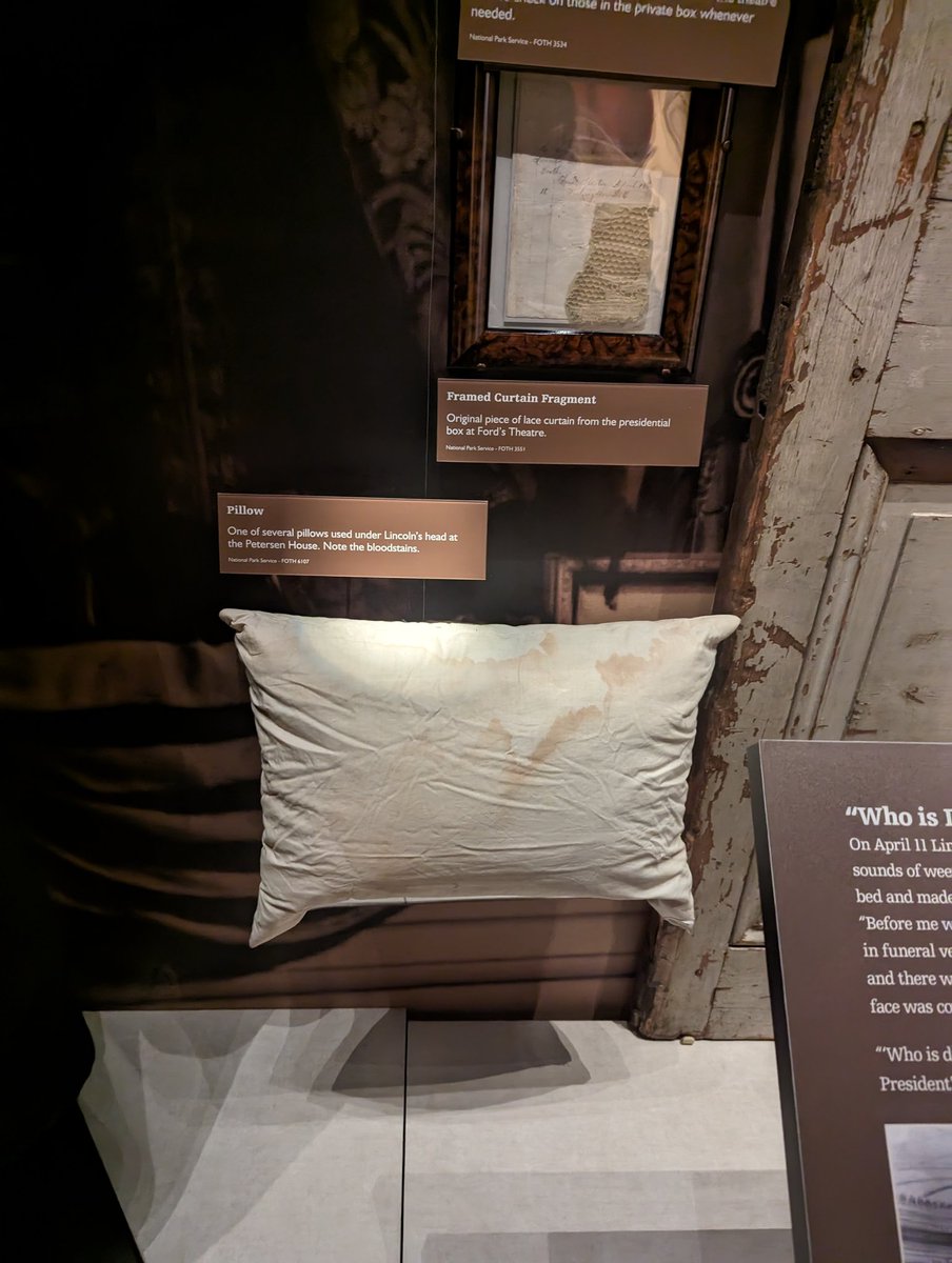This is Lincoln's blood-stained pillow. If I die violently on my bed I hope my friends display my blood stained bed items in my church entryway.
