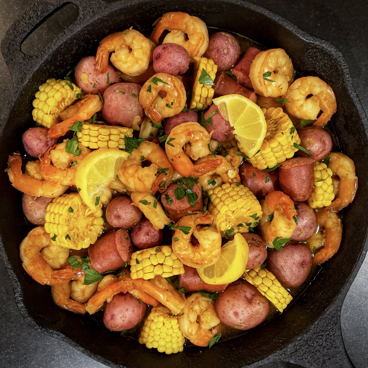 Shrimp boil in #ElBarrio.

Why futz with grimy coals and dirty grills when you can throw #seafood and veggies in a cauldron of bubbling court-bouillon?* For these shrimp, smoked sausages, potatoes, and corn, it's officially hot simmer summer.

*Old Bay, Tabasco, and beer

#foodie