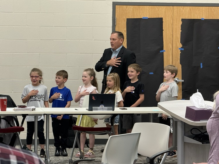 Stewart students help lead the Lakeshore School Board in the pledge of allegiance. Great job!