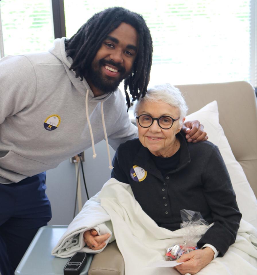 Running back for @UMichFootball, @DEdwards__  visited infusion right before #Mother’sDay to celebrate the moms along with other patients during their treatment. We thank him for stopping by and bringing so many smiles to the patients and caregivers that were there.
